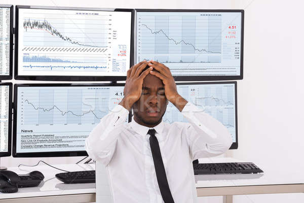 Stock Market Broker With Hands On Head Stock photo © AndreyPopov