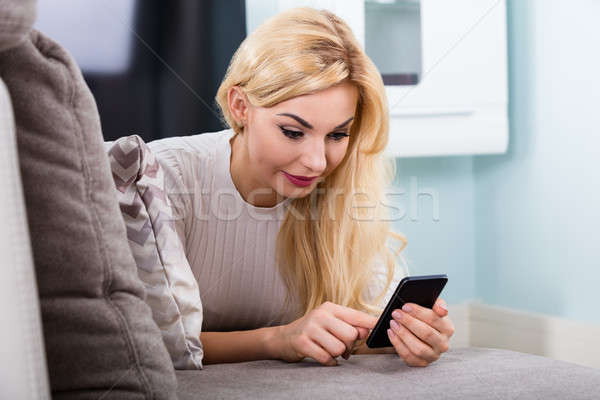 Close-up Of Woman Using Mobilephone Stock photo © AndreyPopov