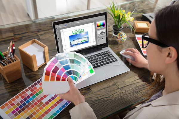 Business Woman Making Color Selection For Logo Design Stock photo © AndreyPopov