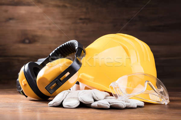 Ear Muff, Safety Glasses, And White Gloves On Table Stock photo © AndreyPopov