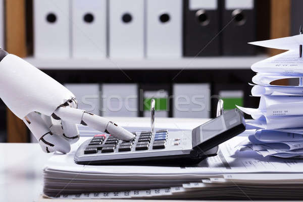 Robot Using Calculator Stock photo © AndreyPopov