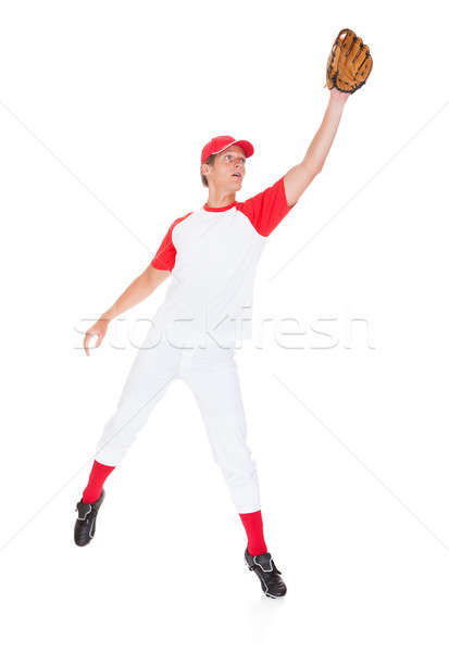 Portre genç beyzbol oyuncusu top beyzbol eldiveni Stok fotoğraf © AndreyPopov