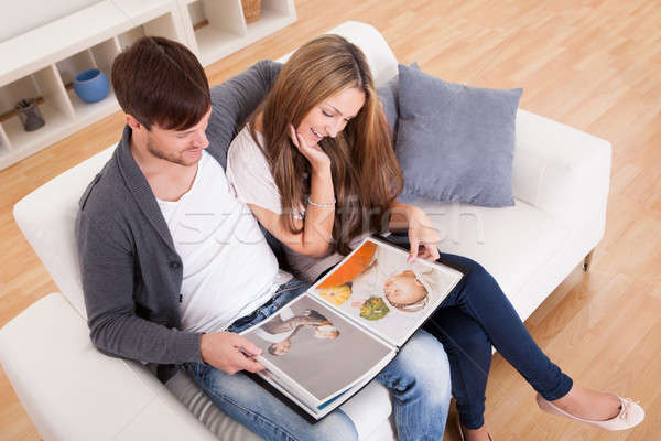 They look at family photo album Stock photo © AndreyPopov