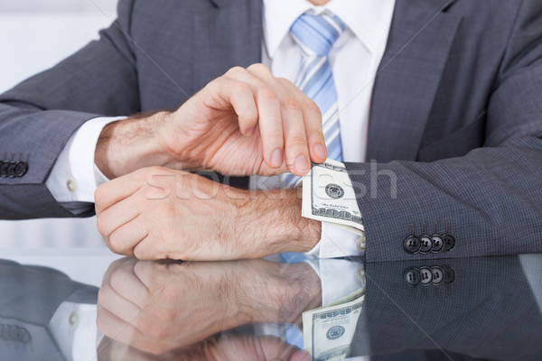 üzletember bank jegyzet kabátujj közelkép húz Stock fotó © AndreyPopov