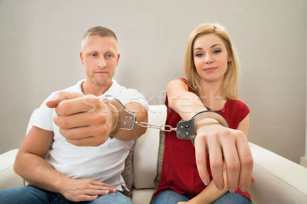 Couple Handcuffed Together Stock photo © AndreyPopov