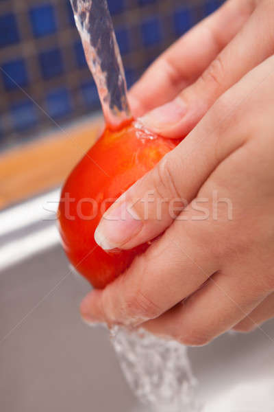 Woman Washing Tomato Stock photo © AndreyPopov