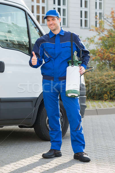 Stock photo: Pest Control Worker Showing Thumbsup By Truck