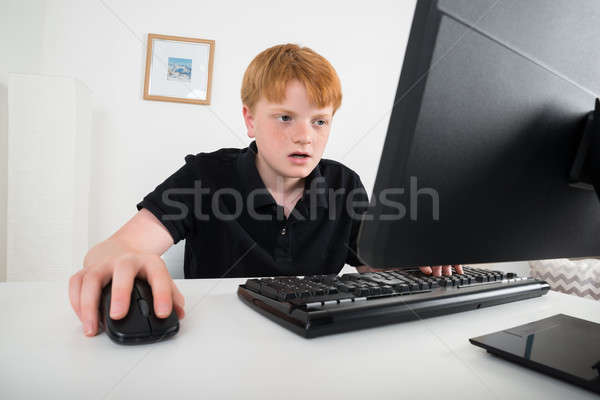 Child Using Computer Stock photo © AndreyPopov