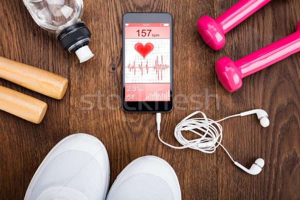Exercise Equipment On Wooden Floor Stock photo © AndreyPopov