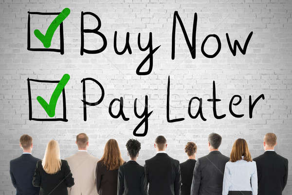 People Looking At Buy Now Pay Later Concept Stock photo © AndreyPopov