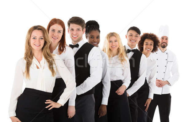 Confident Restaurant Staff Standing In Row Stock photo © AndreyPopov