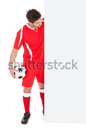 Fußballer spielen Fußball Brust Fußball Hintergrund Stock foto © AndreyPopov