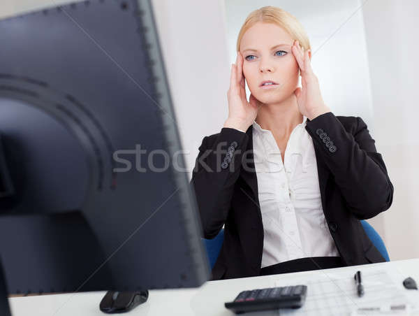 Cheerful young businesswoman with headache Stock photo © AndreyPopov