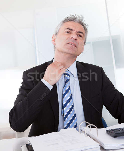 Volwassen zakenman gevoel ongemakkelijk portret business Stockfoto © AndreyPopov