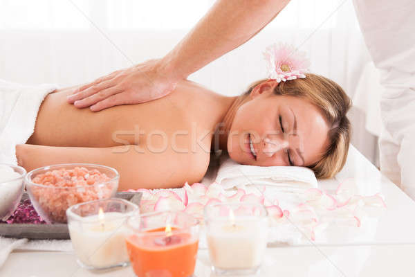 Client relaxing in massage parlor Stock photo © AndreyPopov