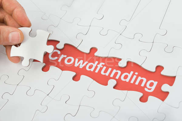 Crowdfunding Text Under Jig Saw Puzzle Stock photo © AndreyPopov