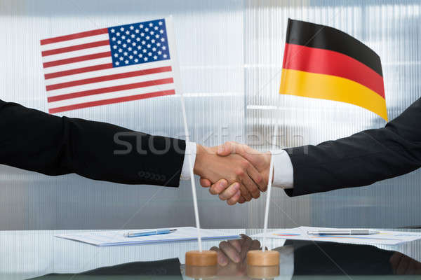 American And German Businessman Shaking Hands Stock photo © AndreyPopov