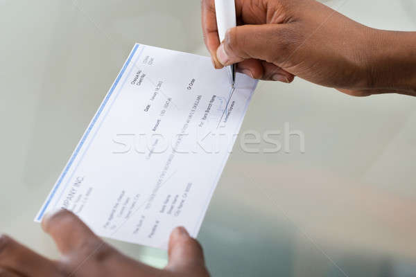 Personen Hand Unterzeichnung Scheck Business Stock foto © AndreyPopov