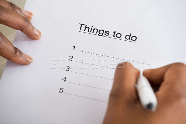 Person's Hand Writing Things To Do List Stock photo © AndreyPopov