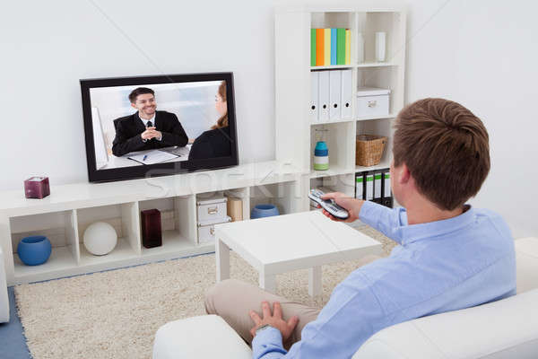 Man Watching Television Stock photo © AndreyPopov