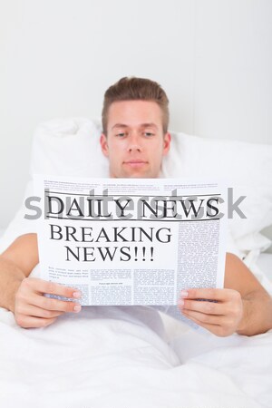 Reading Newspaper With The Headline Strike Stock photo © AndreyPopov