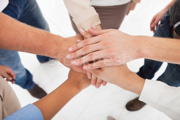 Businesspeople Stacking Hands Stock photo © AndreyPopov