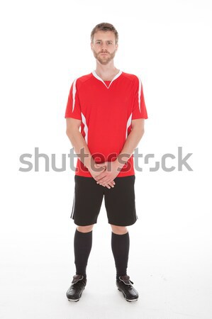 [[stock_photo]]: Jeunes · Homme · footballeur · portrait · rouge · football