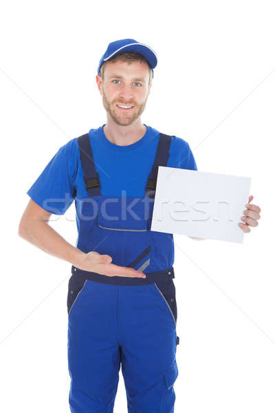 Confident Male Servant Holding Blank Placard Stock photo © AndreyPopov