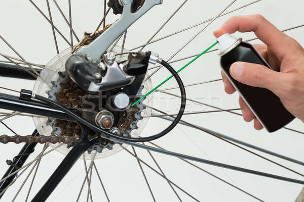 Person Hands Lubricating Bike Stock photo © AndreyPopov