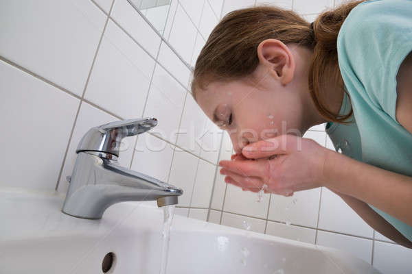 Girl Washing Mouth Stock photo © AndreyPopov