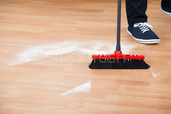 Man Sweeping Hardwood Floor Stock photo © AndreyPopov