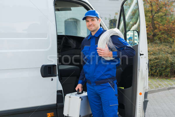 Confident Technician With Cable Coil And Toolbox Stock photo © AndreyPopov