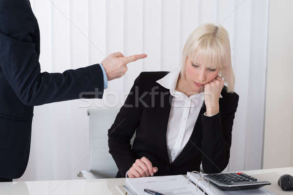 Man Bullying Woman In Office Stock photo © AndreyPopov