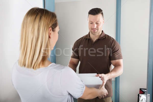 Man Delivering Pizza Stock photo © AndreyPopov