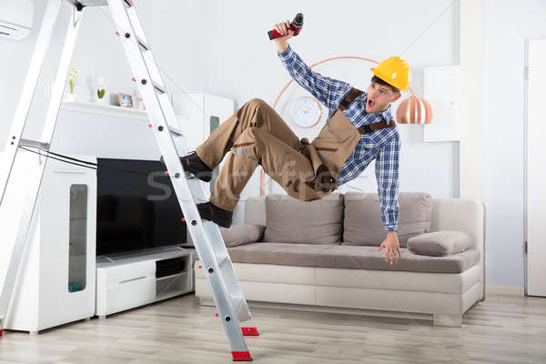 Carpenter Falling From Step Ladder Stock photo © AndreyPopov
