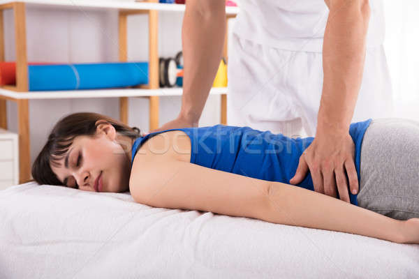 Stockfoto: Maakt · een · reservekopie · massage · vrouw · hand · jonge · vrouw