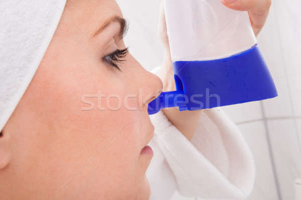 Young Woman Cleaning Nose Stock photo © AndreyPopov