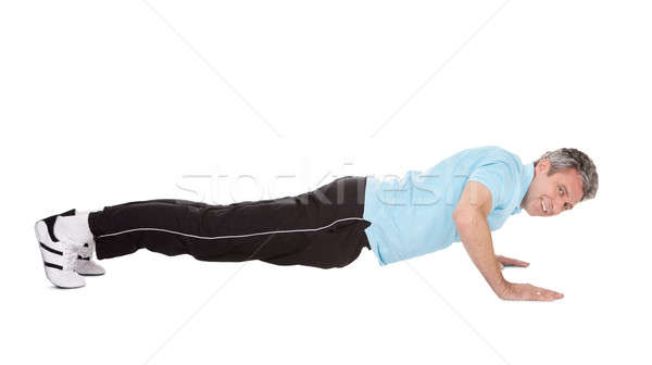 Stock fotó: Aktív · érett · férfi · fekvőtámasz · izolált · fehér · férfi