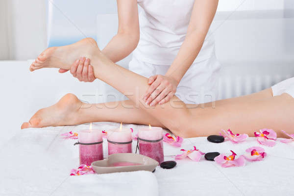 Woman Getting Feet Massage Stock photo © AndreyPopov