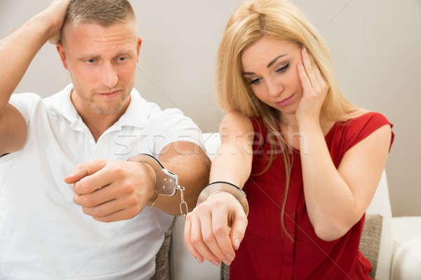 Couple Handcuffed Together Stock photo © AndreyPopov