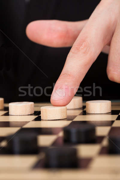 Businessman Playing Checkers Stock photo © AndreyPopov