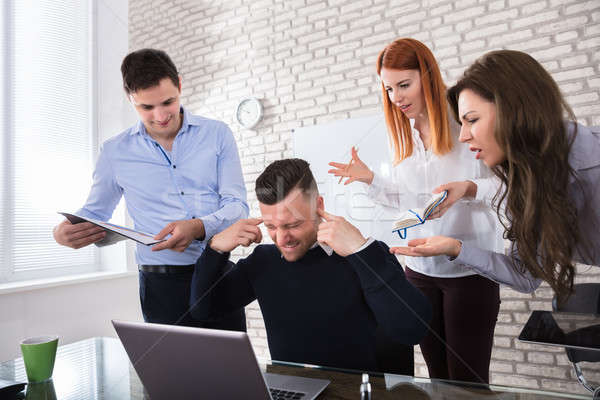 Angry Business People Pointing At Colleague Stock photo © AndreyPopov