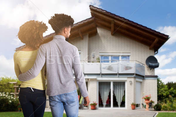 Couple Standing In Front Of House Stock photo © AndreyPopov