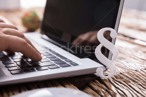Businessperson's Hand Using Laptop Stock photo © AndreyPopov