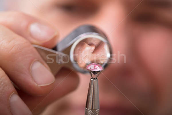 Person Checking Diamond Through Magnifying Loupe Stock photo © AndreyPopov