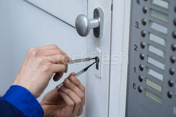 Close-up Of A Person Opening Doors Stock photo © AndreyPopov