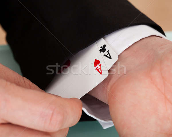 Pair of ace in man sleeves Stock photo © AndreyPopov