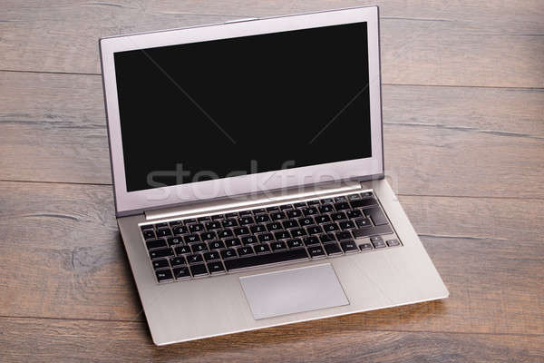 Moderna ordenador portátil foto mesa de madera Foto stock © AndreyPopov
