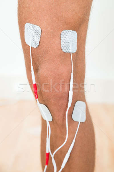 Person Leg With Electrodes On Knee Stock photo © AndreyPopov