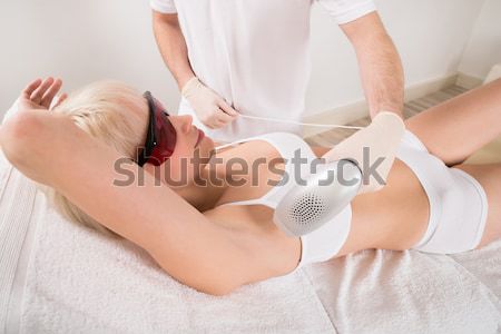 Frau Laser Epilation Behandlung Beine Therapeut Stock foto © AndreyPopov